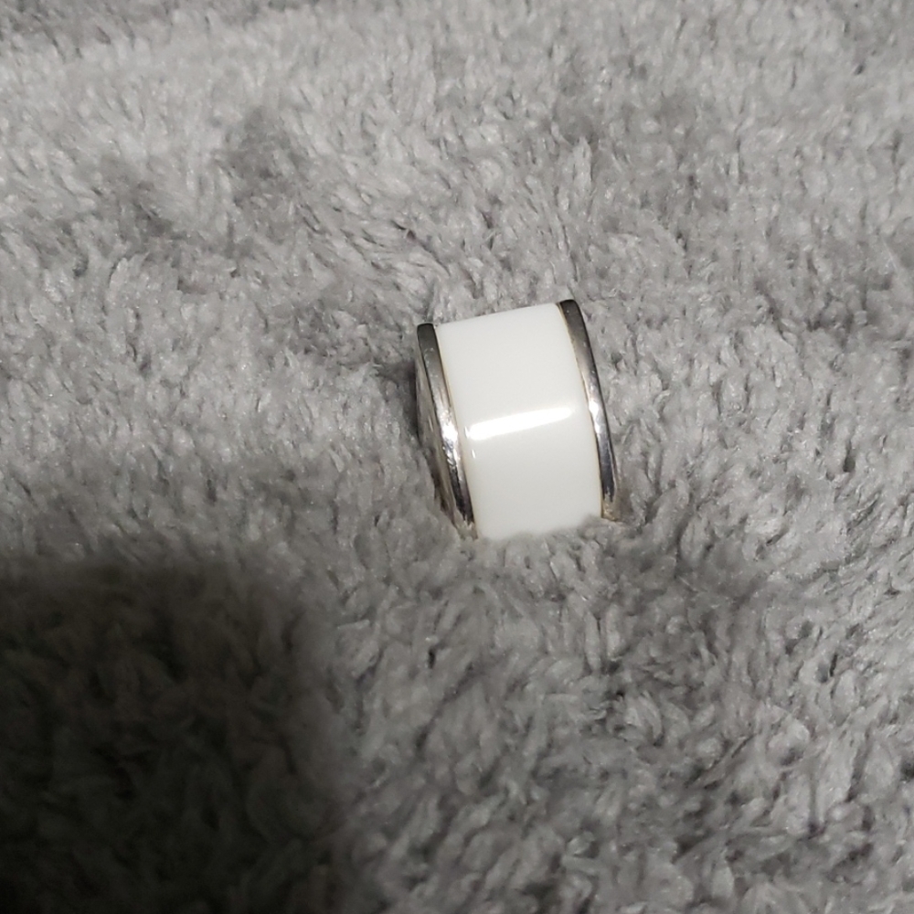SS white quartz ring.  1 inch in length.
